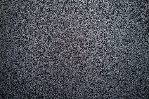 Close up of tarmac laid by road construction companies